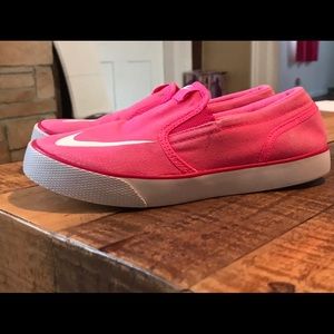 Slip on pink Nike shoes
